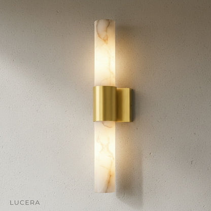Close-up of marble detail and copper finish on Umbra Alabaster wall sconce