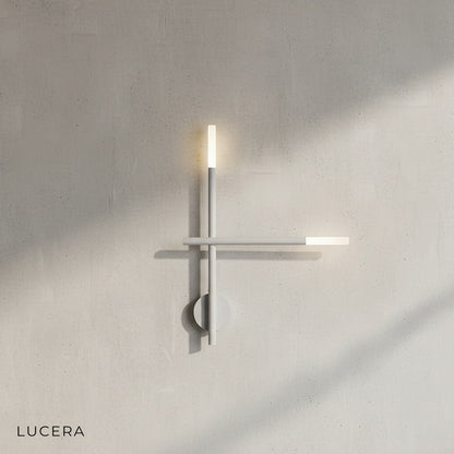 close-up detail of premium wrought aluminum finish on modern wall lamp with soft glow
