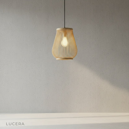 minimalist bamboo pendant lamp centered in bright studio setting with soft shadow