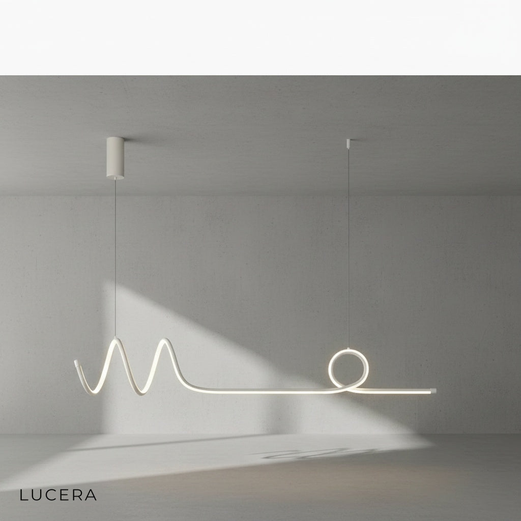 Eira Nordic pendant lamp with long strip, night mode, casting elegant shadows on a white wall