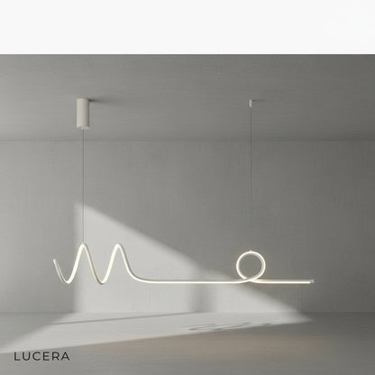 Eira Nordic pendant lamp with long strip, night mode, casting elegant shadows on a white wall