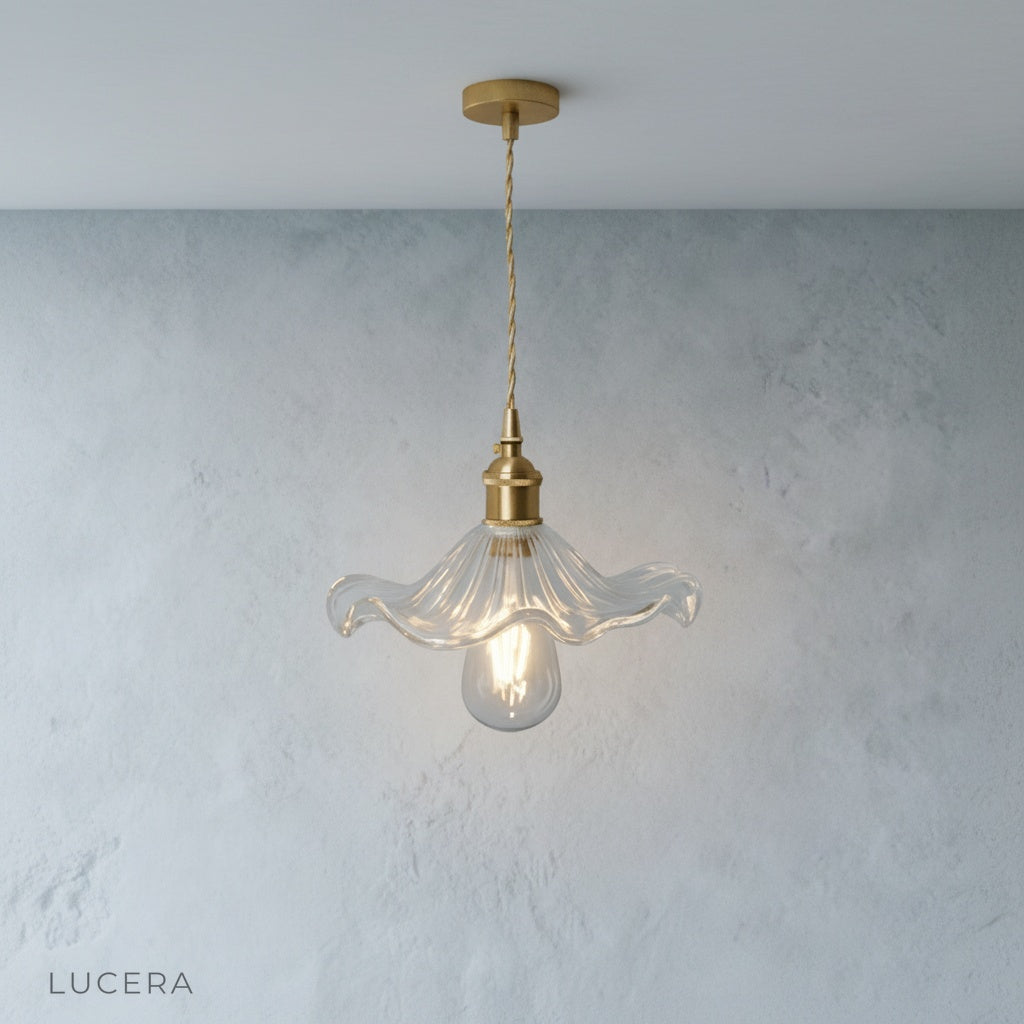 studio back view of Lucera pendant light showing brass canopy and adjustable wire