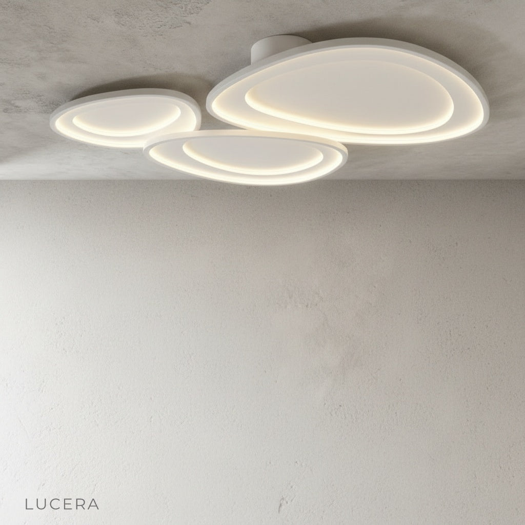 Tantalus ceiling light in studio loft with industrial accents and soft glow