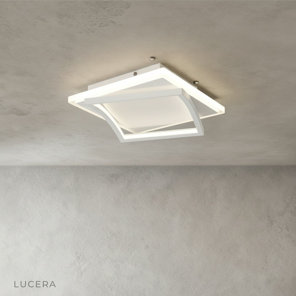 overhead view of broom ceiling light showing circular acrylic diffuser and metal rim