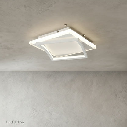 overhead view of broom ceiling light showing circular acrylic diffuser and metal rim