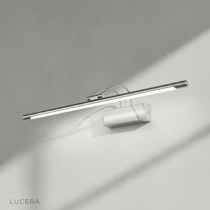 Alluvium lamp installed in a contemporary stairwell casting upward light