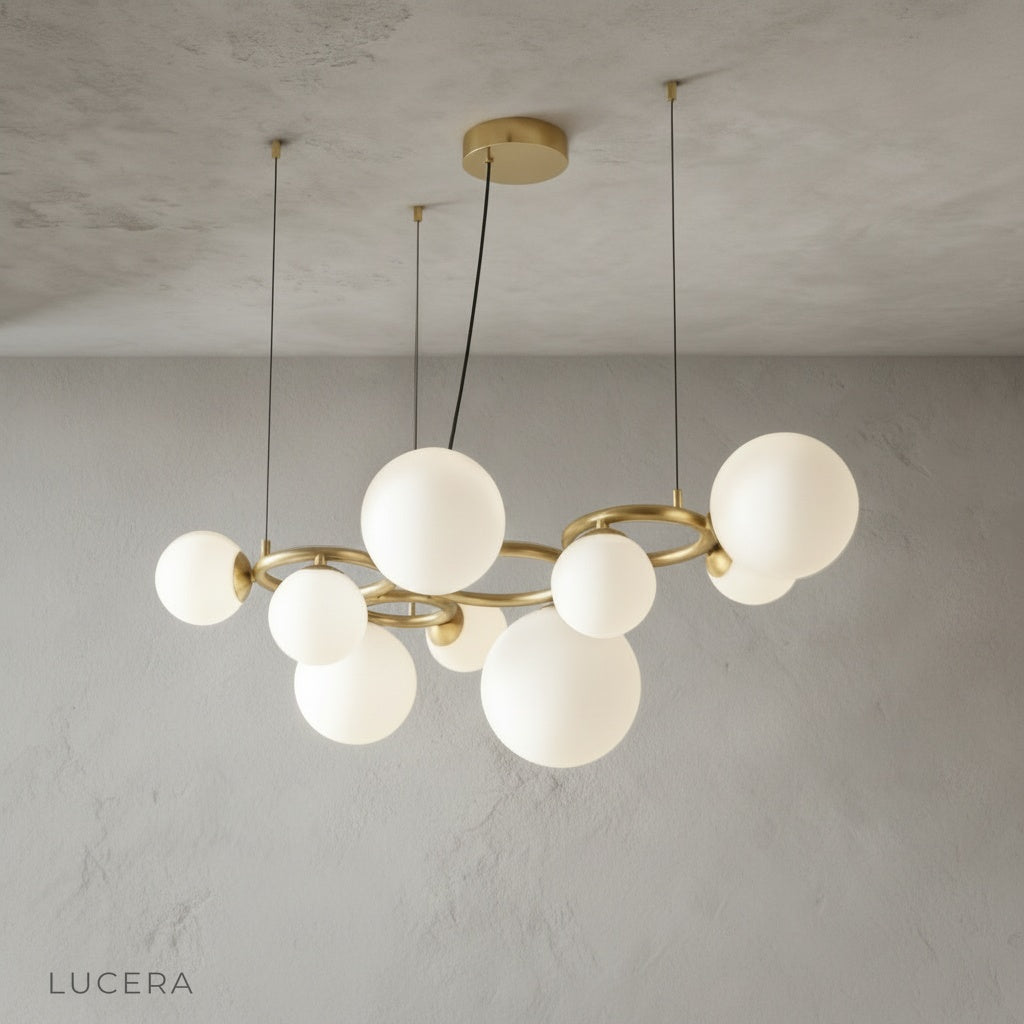 Grenache chandelier in minimalist dining area with wooden table