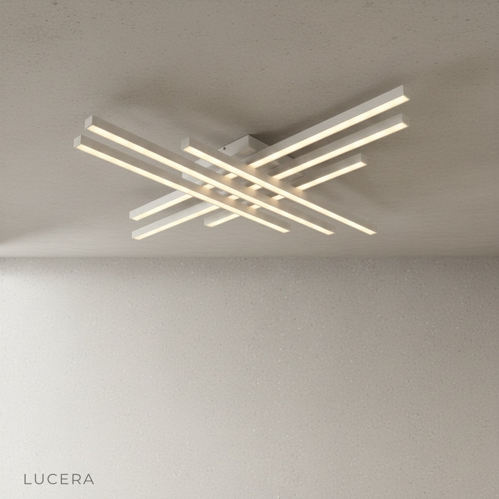 nighttime lifestyle shot of Upland ceiling light glowing in modern entryway with plants