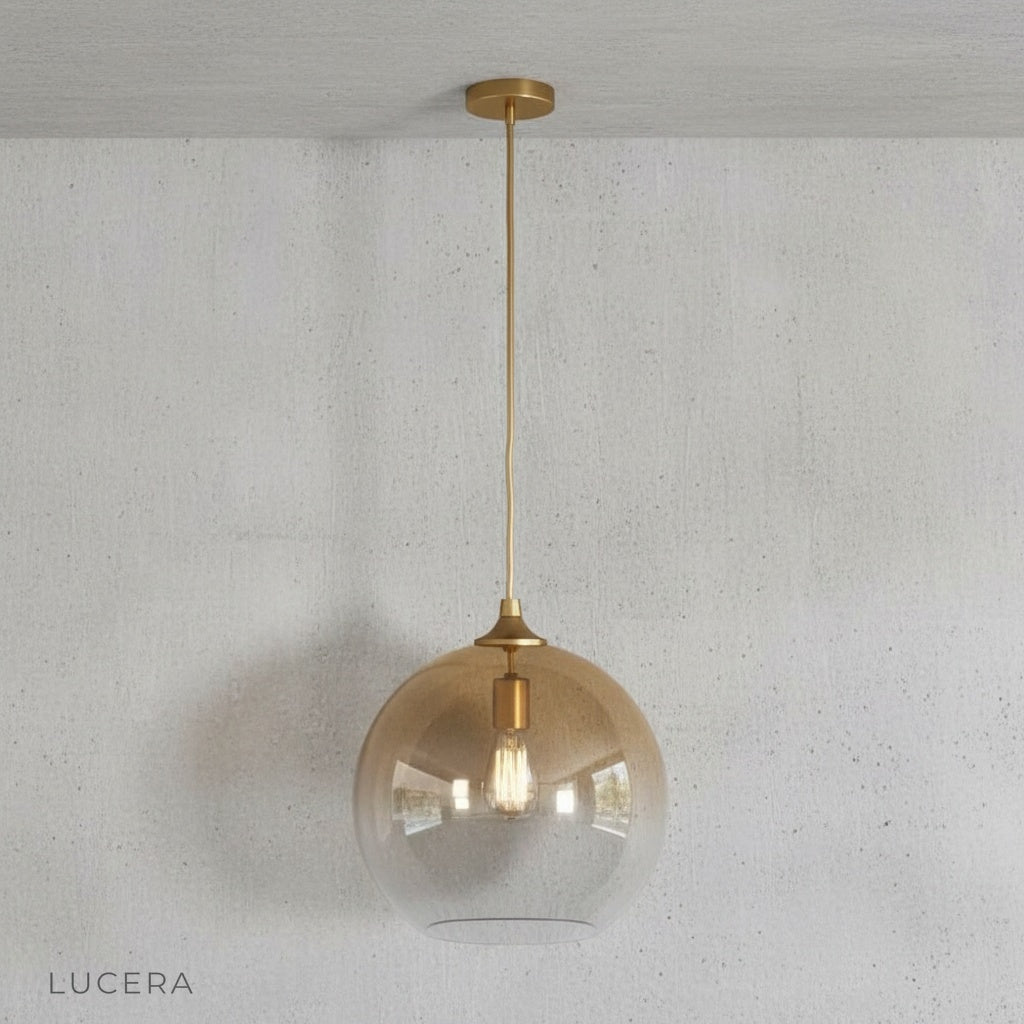 Nighttime shot of green gold pendant light creating intimate ambiance in a reading nook