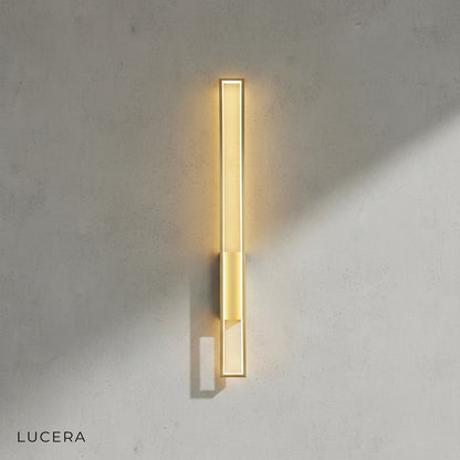 IP44 waterproof copper sconce mounted on covered outdoor patio wall near plants