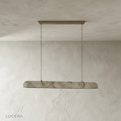 close-up of Nerissa chandelier copper frame detail and alabaster shade texture