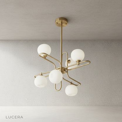 contemporary glass globe chandelier sleek metal frame studio shot