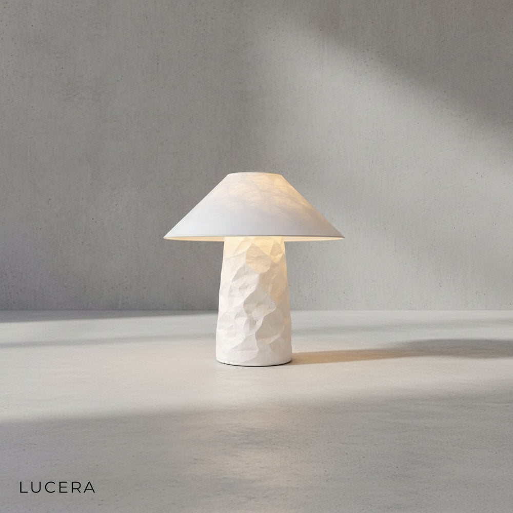 Close-up of the warm glowing paper shade highlighting the handcrafted wabi-sabi texture