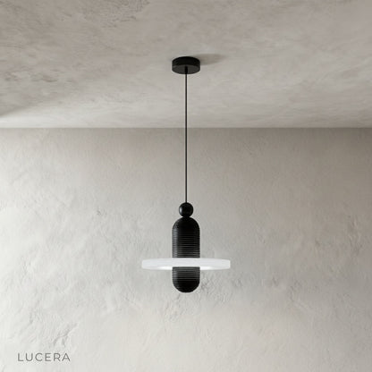 close-up of alabaster shade texture with soft diffused light from pendant