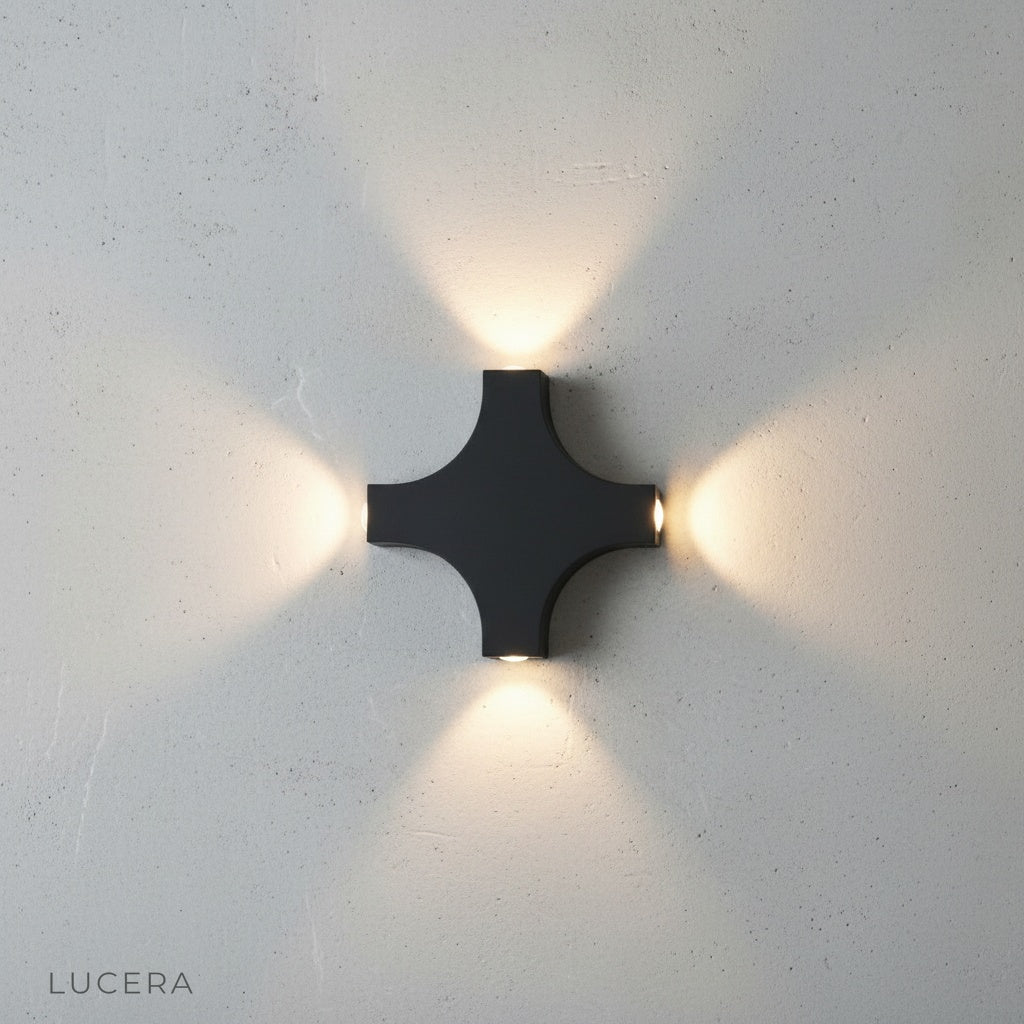 close-up of gold wall lamp detailing waterproof metal shade and arm