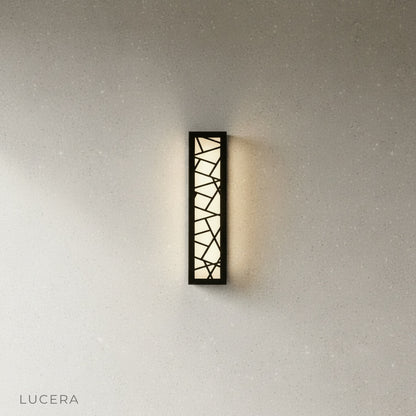 close-up view of the Emblem Wall Lamp's waterproof aluminum body and diffuser