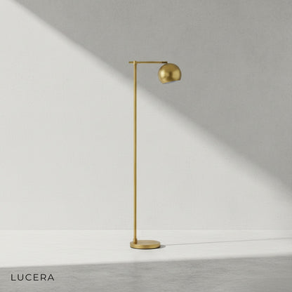 Black floor lamp with warm 3000K light casting elegant glow in modern bedroom