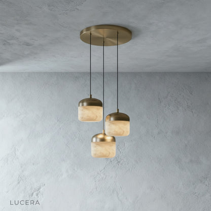 close-up of alabaster stone texture and warm glow on the Energico pendant