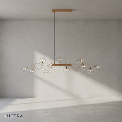 detail view of LED light glowing inside frosted glass globe of Lucera chandelier