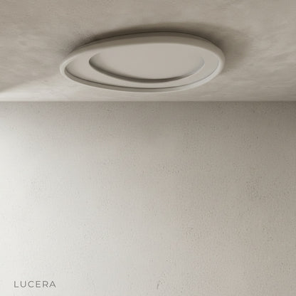 Close-up of Tantalus ceiling light organic shapes and white chrome texture