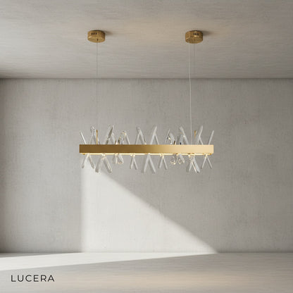 Arte gold chandelier with selectable color temperature in bright setting