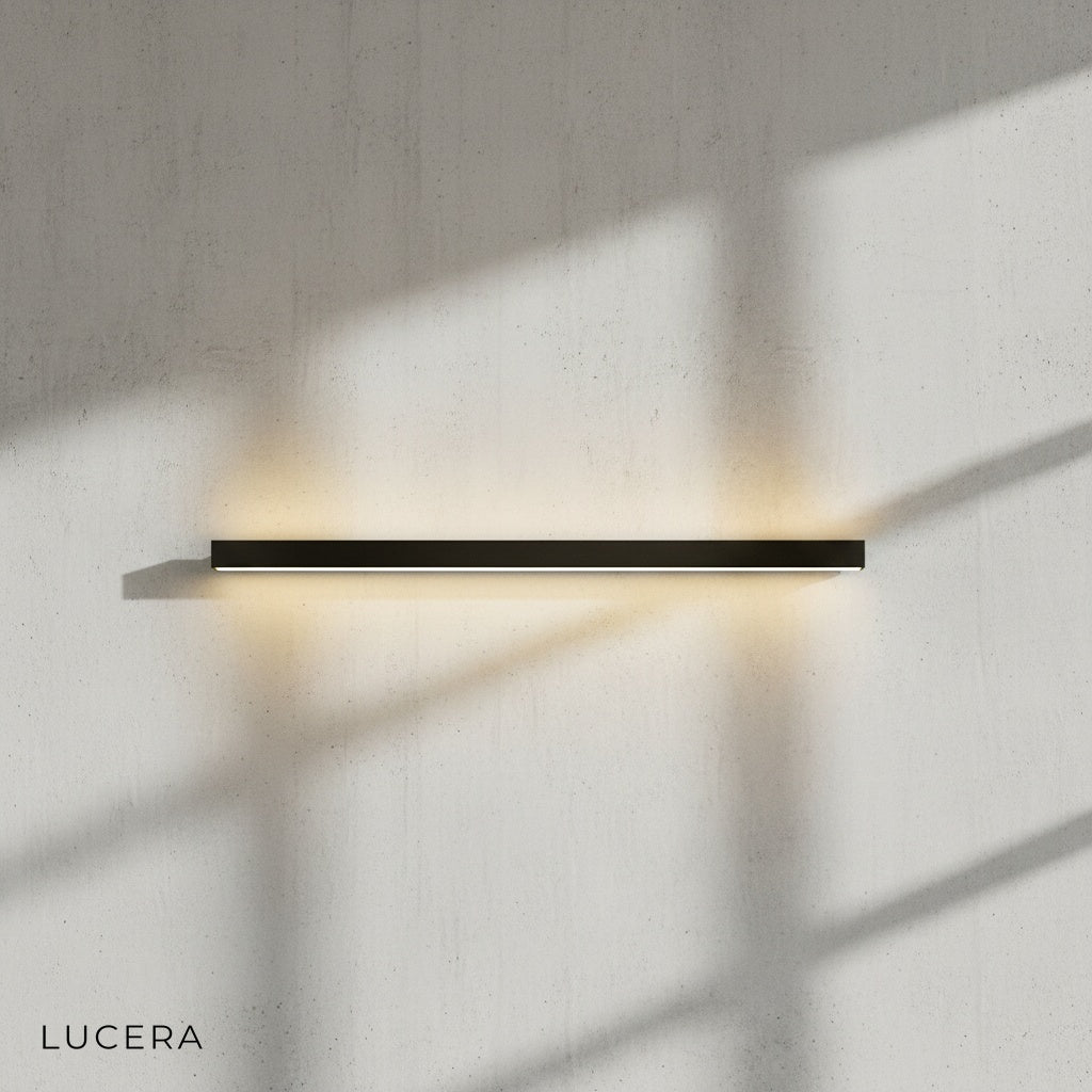 detail of acrylic shade diffusing soft glow on Staccato Bookshelf LED Wall Lamp
