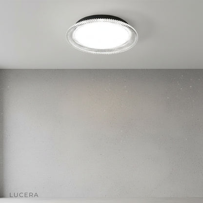 close-up of Zelo ceiling light acrylic ring texture and iron frame detail