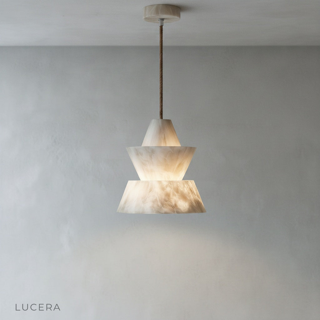 Close-up detail of twisted alabaster texture on Fillet pendant light revealing natural veining