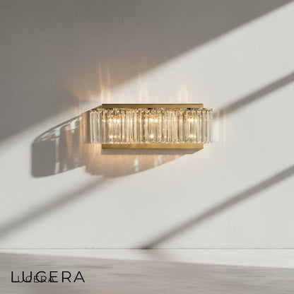 Vibrato sconce in silver finish mounted on neutral wall, modern hallway ambient lighting