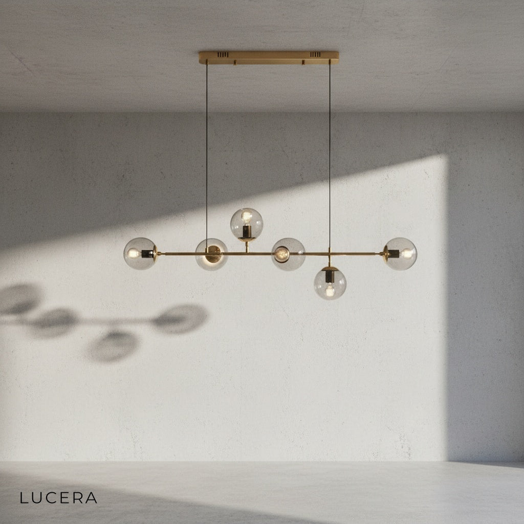Dag pendant light with adjustable height cords in a bright kitchen island setting
