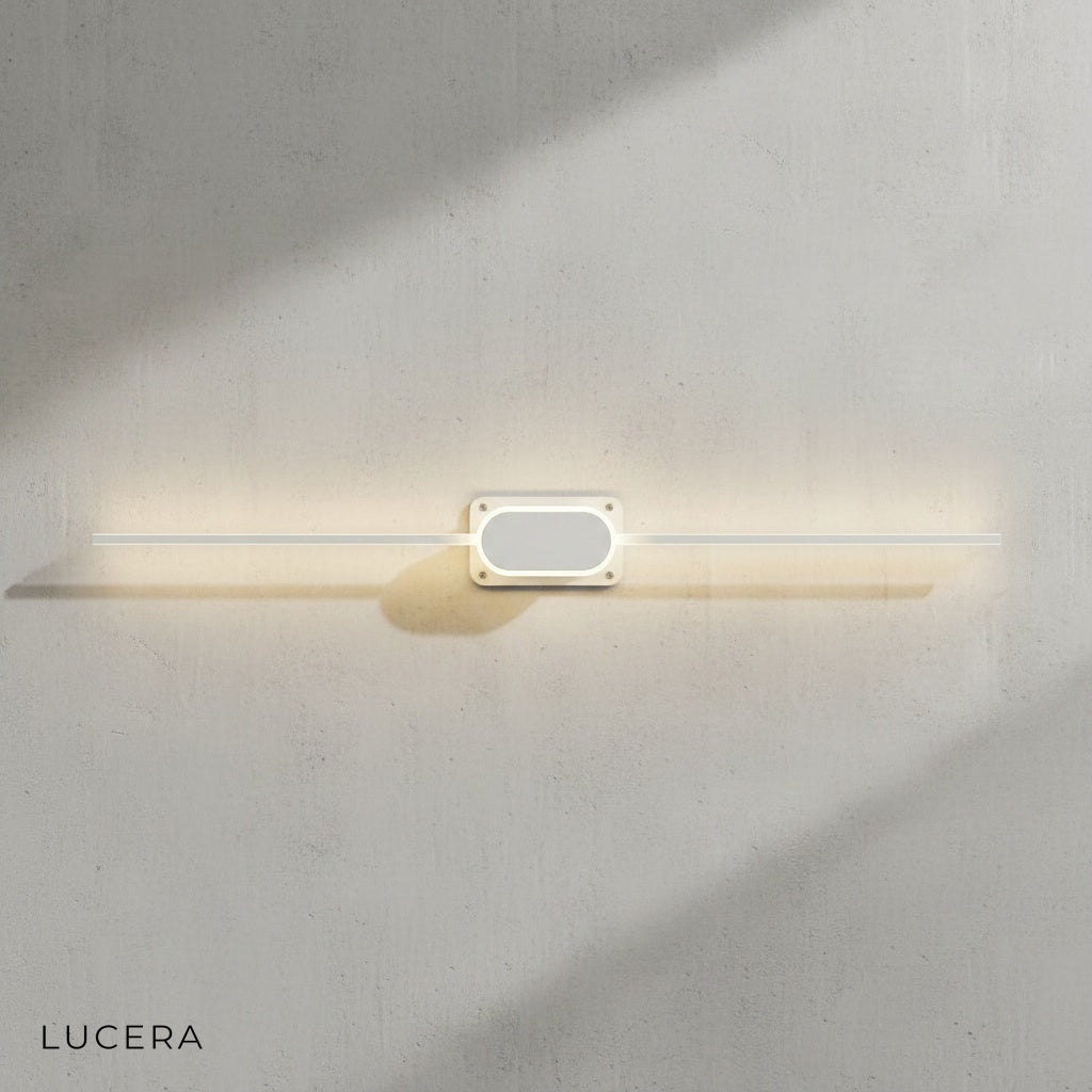 Calando LED mirror lamp in white metal with warm 3000K glow in bright bathroom