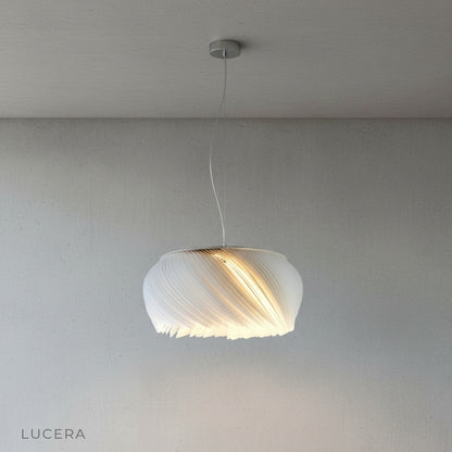 Close-up of Theron chandelier wavy white acrylic and parchment lampshade texture