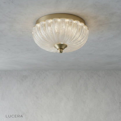 close-up of brass accents on iron frame of decorative ceiling light