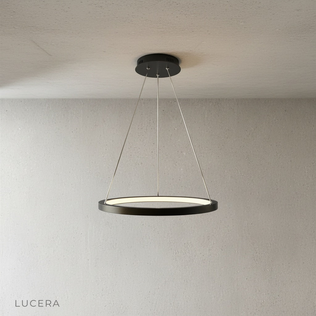 close-up of brushed aluminum ring and acrylic diffuser on wash chandelier