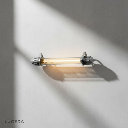 Vigrid Faulensee industrial wall lamp with grey iron bracket detail and visible screw mounts