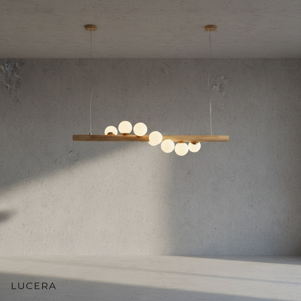 Svartr chandelier with warm LED light illuminating a cozy kitchen island in a Scandinavian home