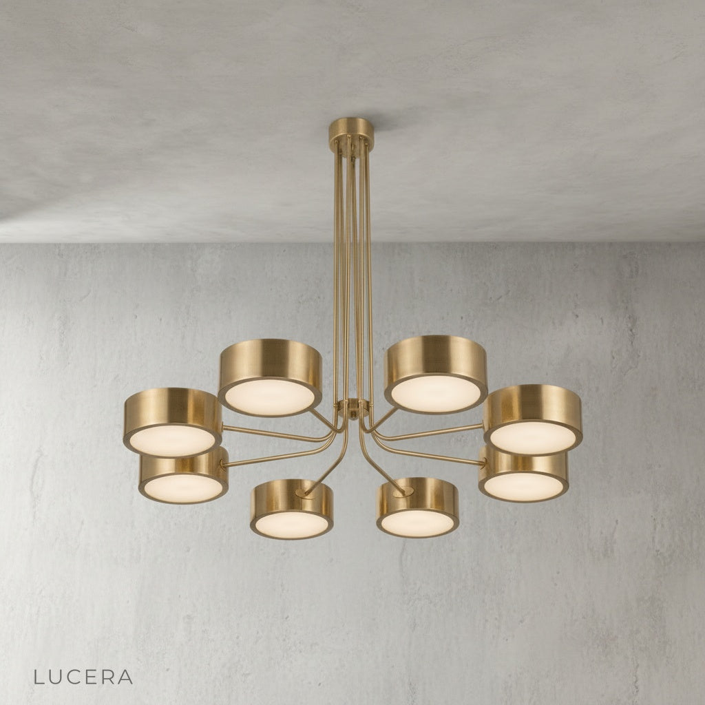 close-up of brushed brass finish on Lacrima chandelier arm and socket