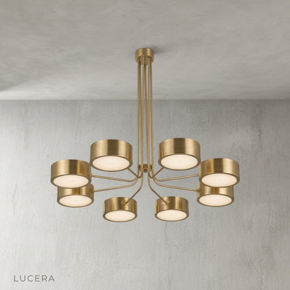 close-up of brushed brass finish on Lacrima chandelier arm and socket