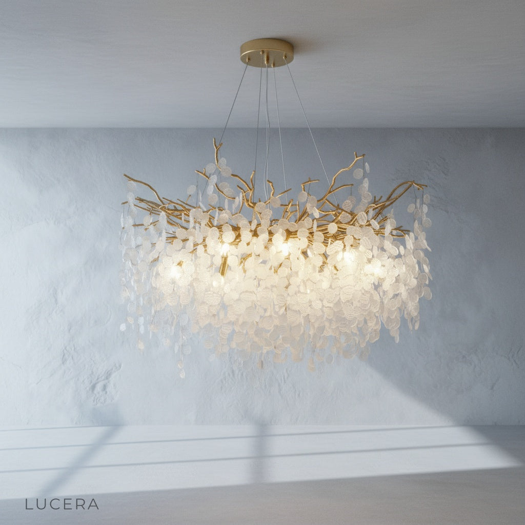 close-up of crystal leaf details on gold chandelier frame