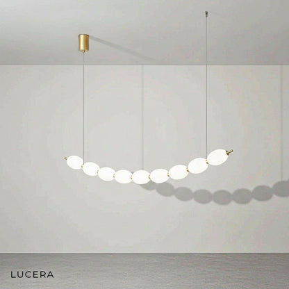 Adjustable hanging length mechanism on chrome string of pearls pendant chandelier with iron frame