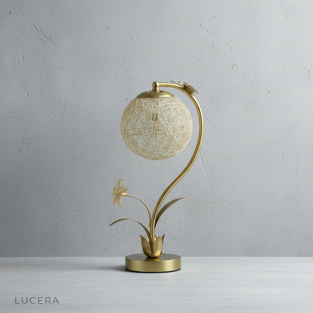 Domenica Table Lamp front view on white backdrop, faux floral accents and butterfly detail