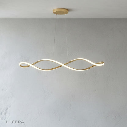 close-up of Damaske chandelier twisted metal details with warm light through acrylic