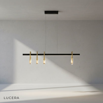 Jord pendant lamp with neutral 4000K LED light casting soft glow on minimalist dining table
