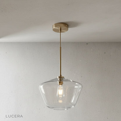 close-up of smoked glass shade and brass finish on Sake pendant light