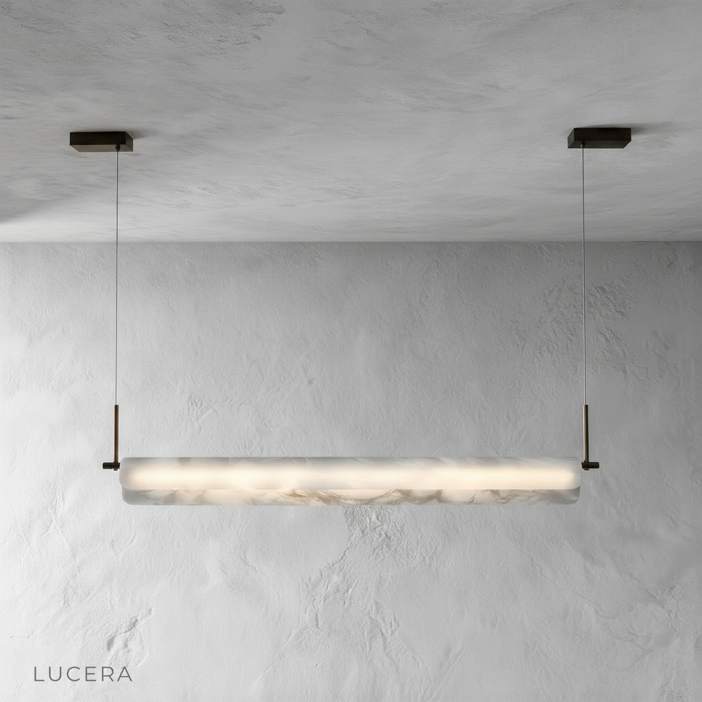 Close-up detail of the natural alabaster stone texture on the Parlor pendant light shade