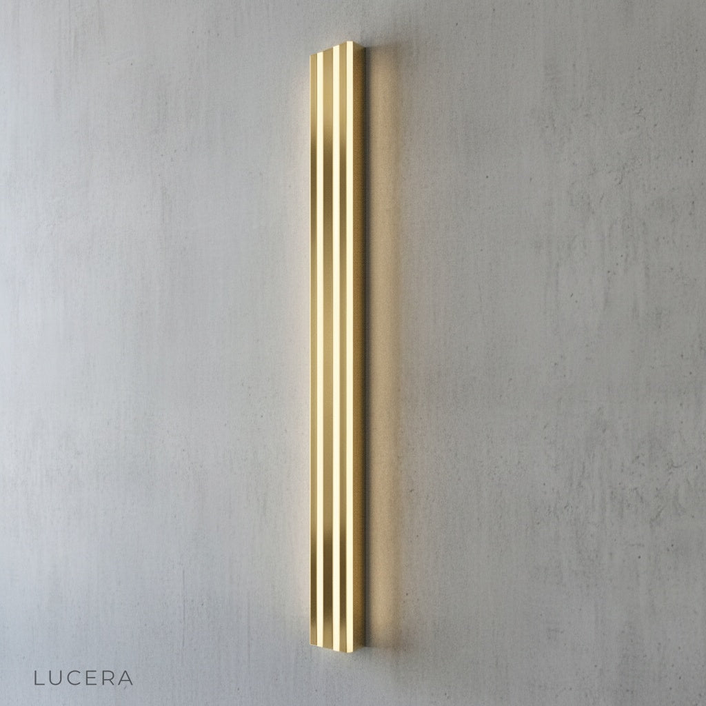 Hesperus wall lamp side profile studio view sleek black body clear acrylic diffuser