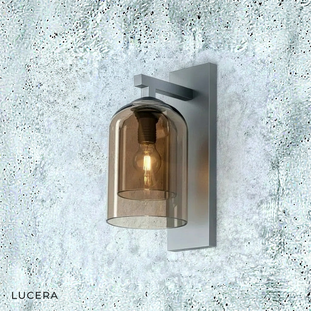 warm LED lighting from dome-shaped wall fixture casting soft ambient shadows on textured wall