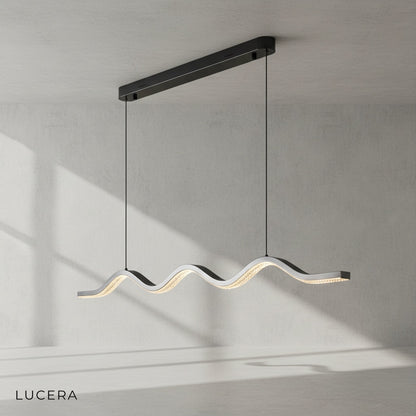 sculptural pearl black wave chandelier as focal point in minimalist hallway with neutral decor