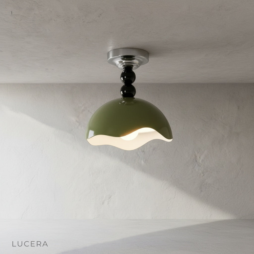 Studio shot of Aegis semi-flush mount ceiling light with glossy aluminum shade