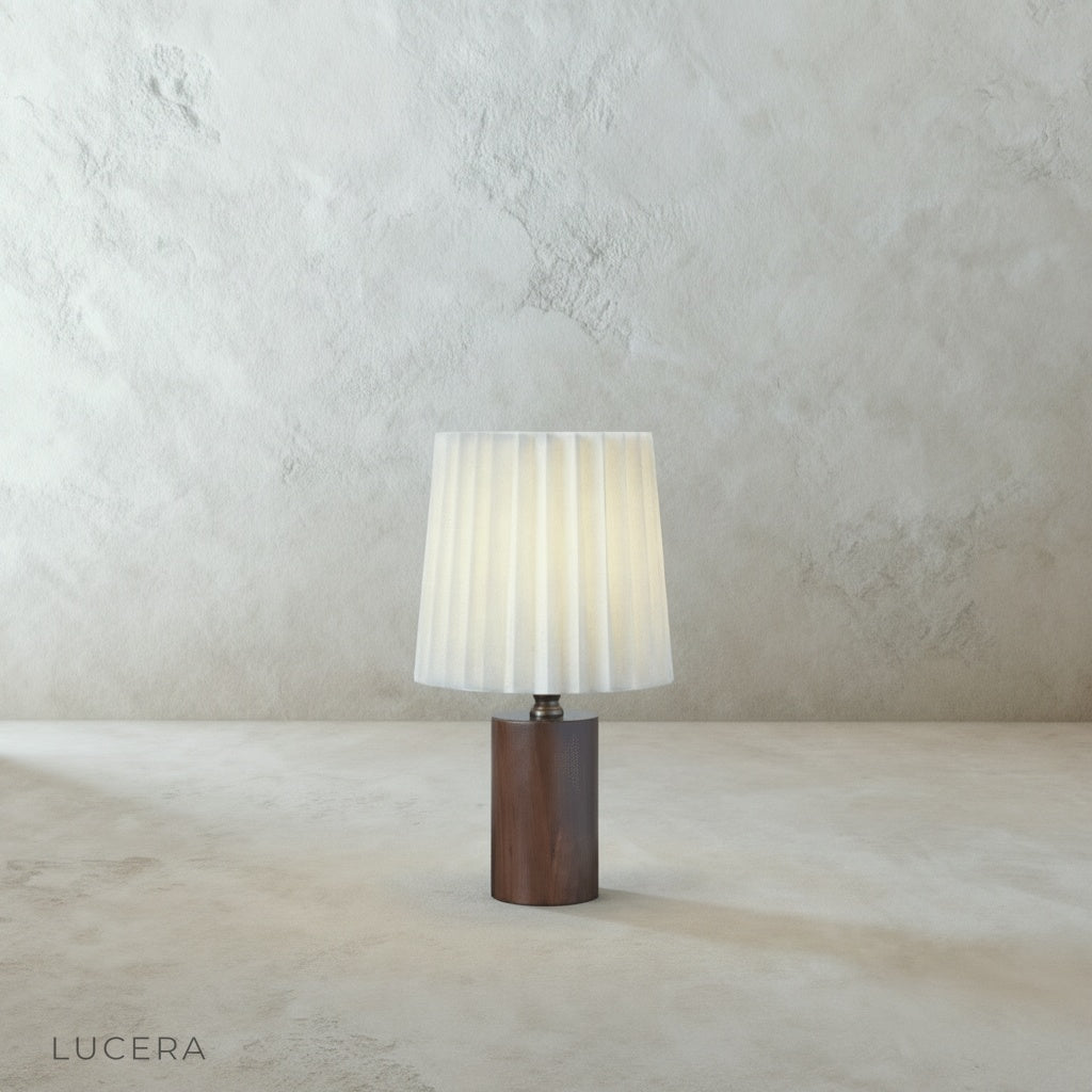Close-up of Pandora Table Lamp antiqued brass pull chain and solid wood column with visible craftsmanship